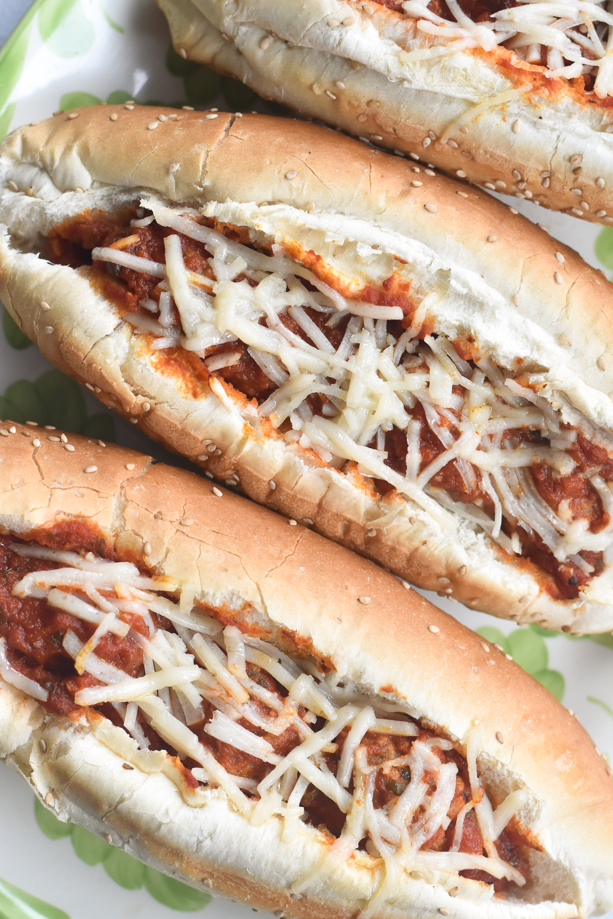 Easy vegan dinner idea! Vegan meatball subs made with store-bought meatballs, an easy tomato sauce and topped with vegan cheese.