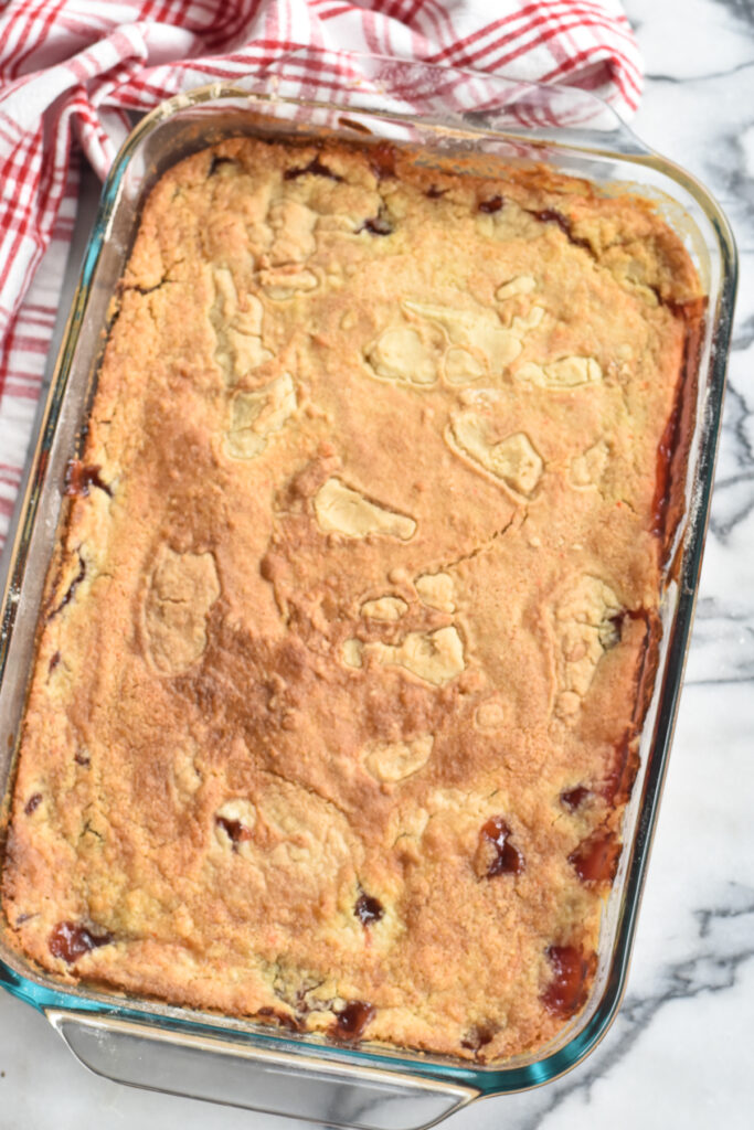 For a vegan cherry dump cake, use a vegan-friendly yellow cake mix. Look for a cake mix without and milk products. For the butter, use a vegan plant-based butter. 