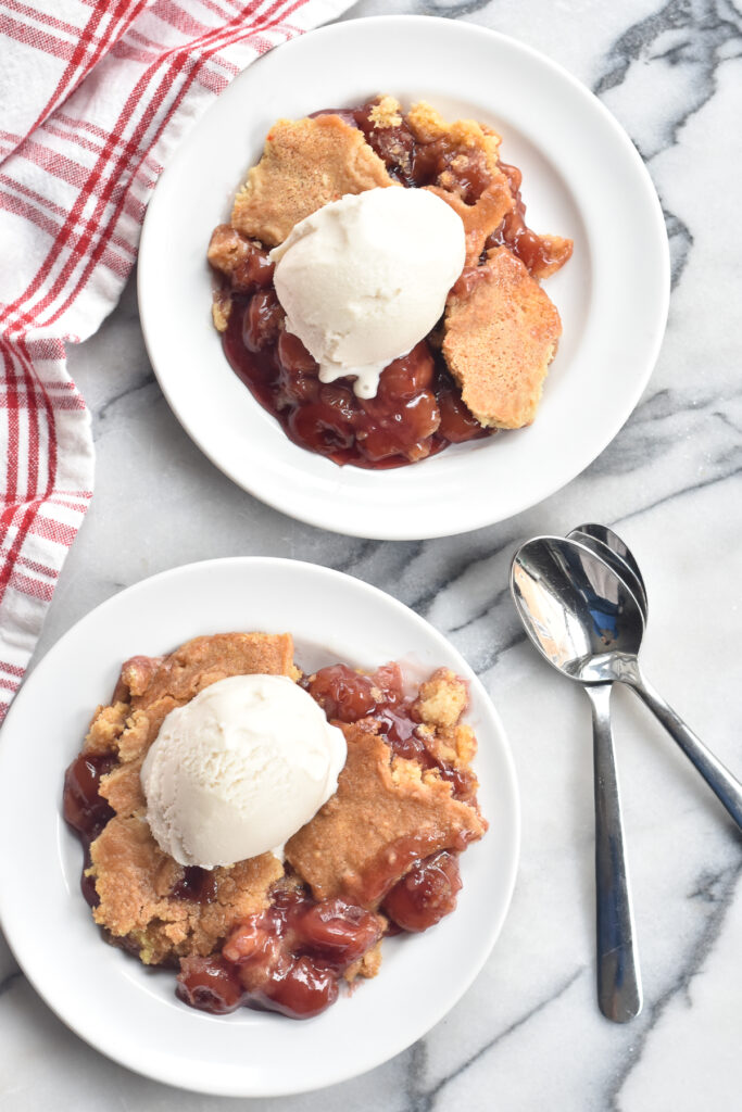 This easy Cherry Pie Filling Dump Cake dessert is made with just a few simple pantry-friendly ingredients . The best part of this dessert recipe is that you just dump everything into the baking dish and bake! 