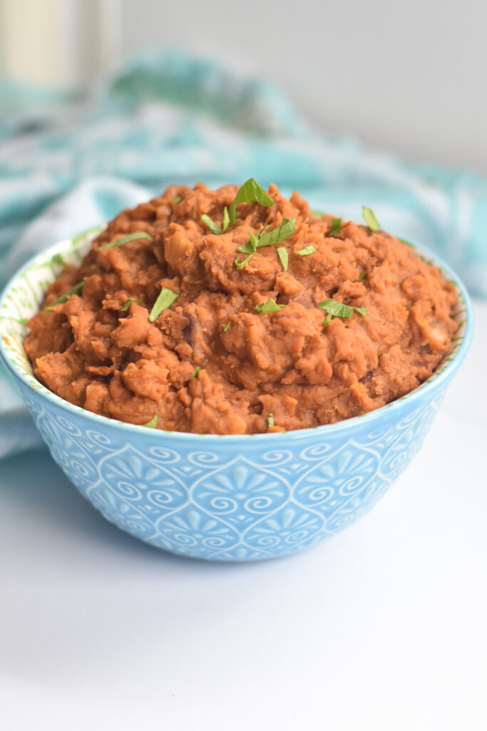 Elevate basic canned refried beans by adding chorizo. 