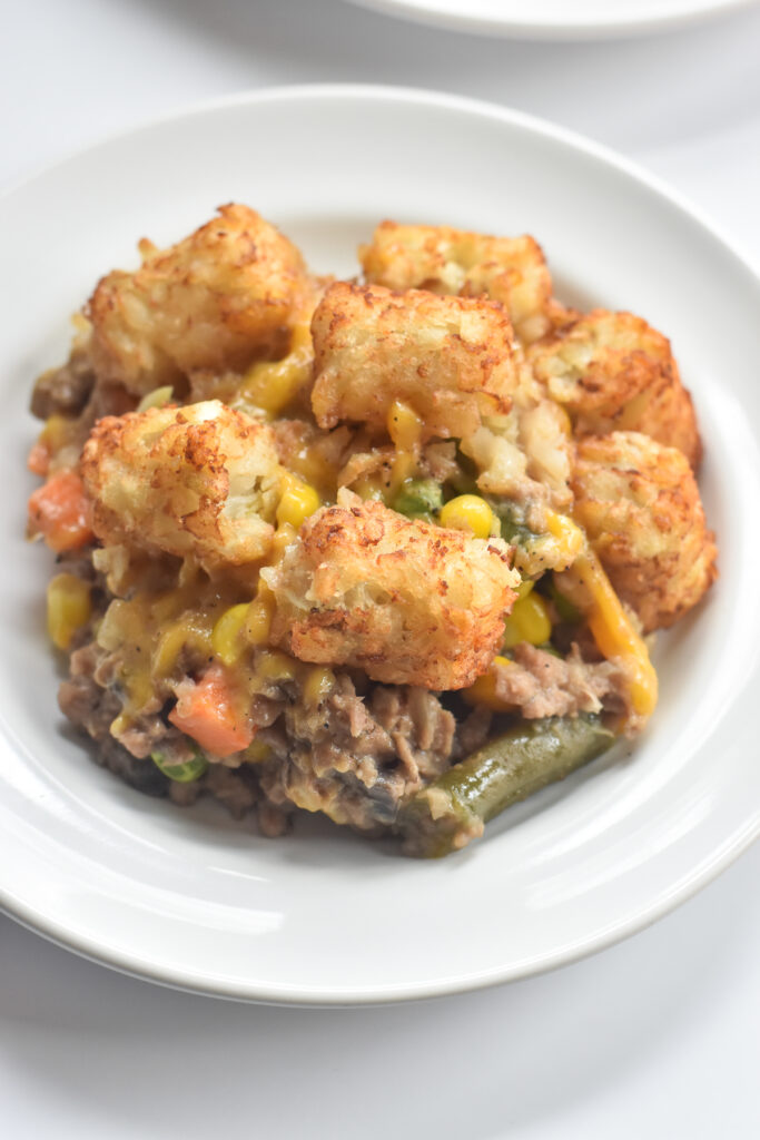 This one pan tater tot casserole is loaded with veggies, plant-based meat, vegan cheese and topped with tater tots. It wouldn't be a tater tot casserole without some tater tots! 