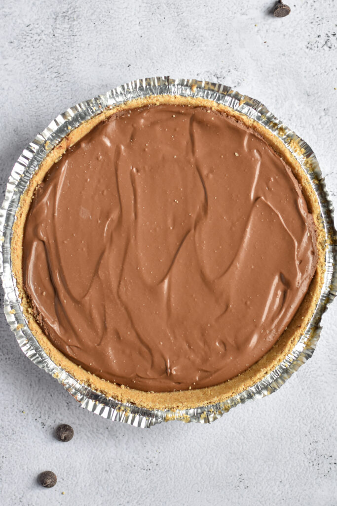 Creamy, rich Vegan Chocolate Peanut Butter Pie is an easy no bake dessert perfect for any occasion. 