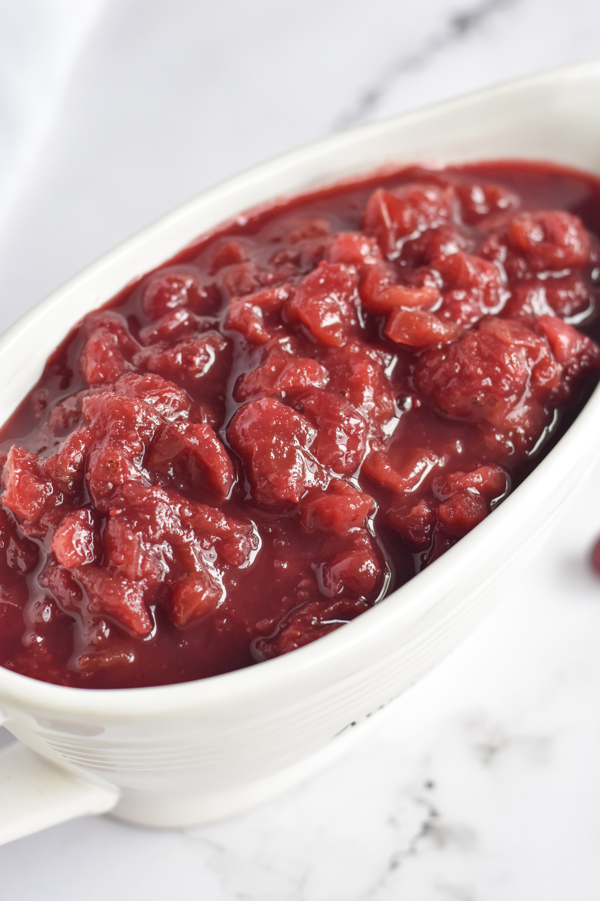 This Slow Cooker Cranberry Sauce is a great make-ahead side dish for your Thanksgiving day meal.