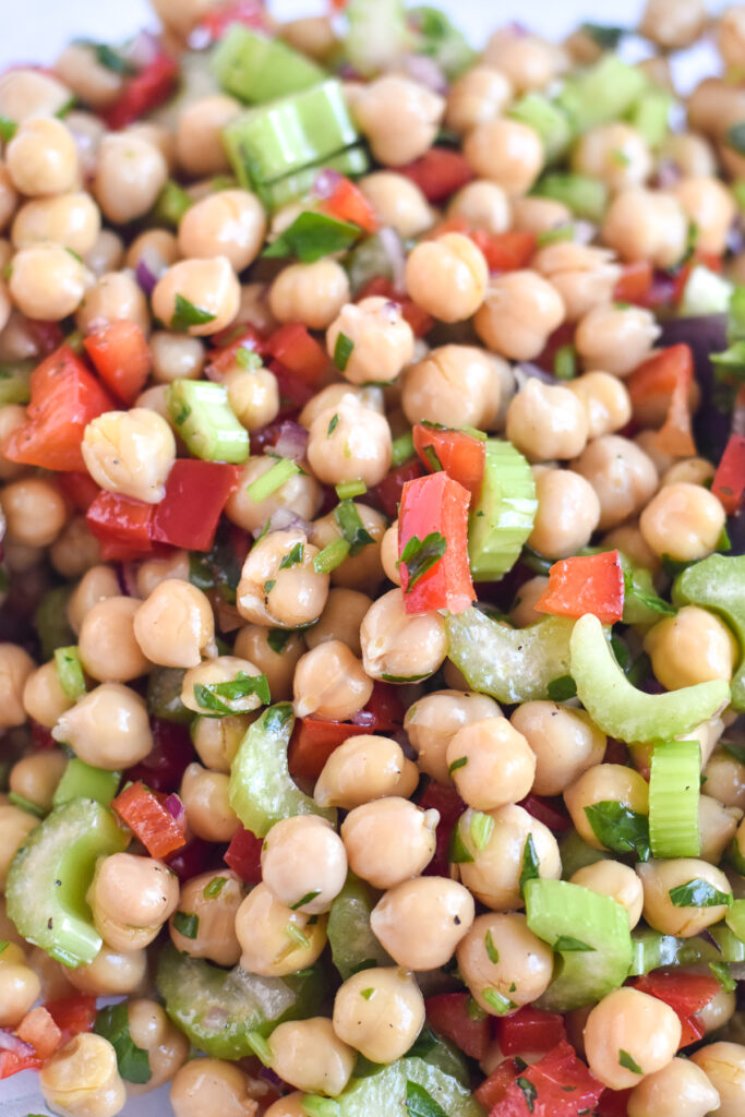 Healthy, vegan salad recipe featuring chickpeas, celery and bell peppers. 
