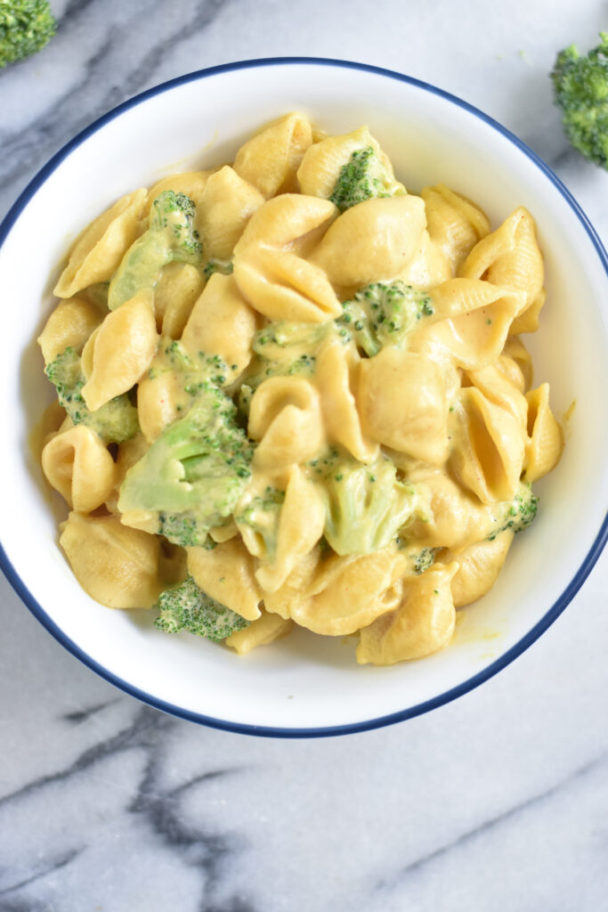 Creamy stove top vegan mac and cheese with broccoli is a family favorite. Raw cashews create an ultra creamy cheese sauce that is completely dairy-free. 