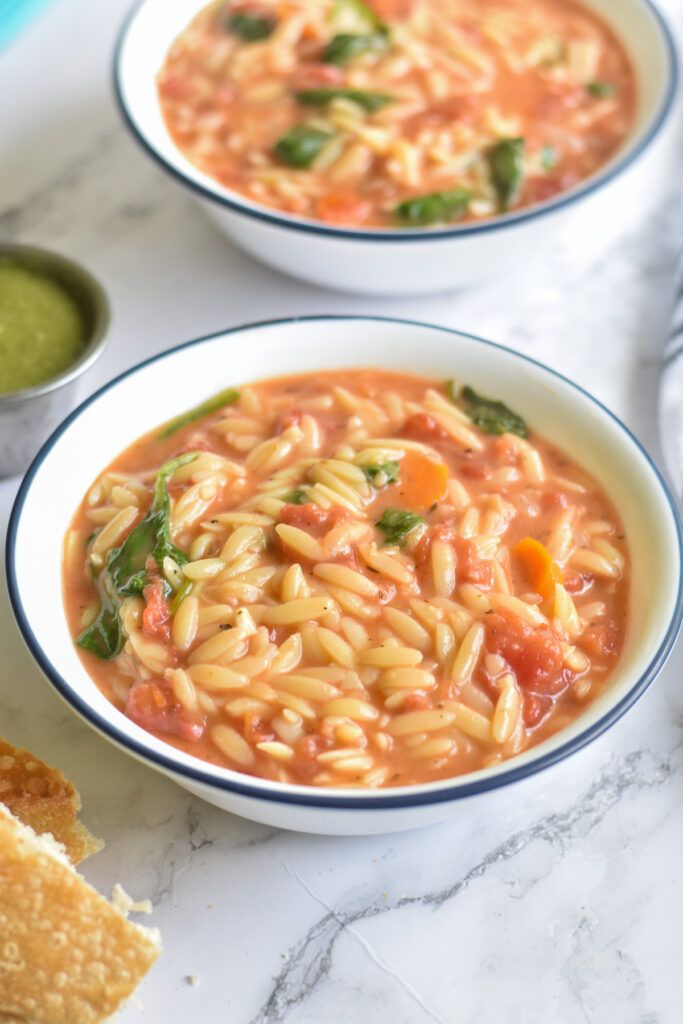 Vegan Orzo Soup with vegetables and spinach is a hearty, comforting soup recipe. 