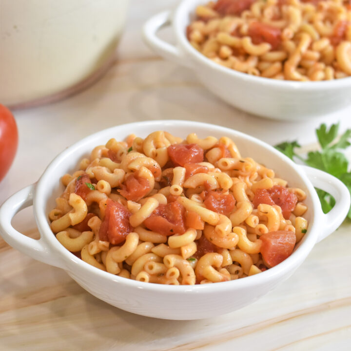 Vegan Macaroni with Tomatoes pasta recipe is a simple one pot pasta recipe that is kid-friendly and uses pantry ingredients.